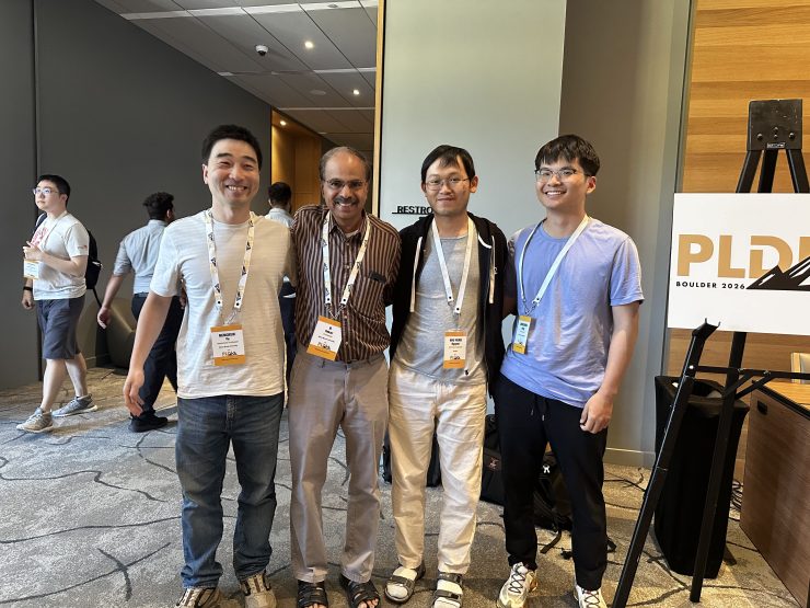 Paper authors pose at PLDI conference